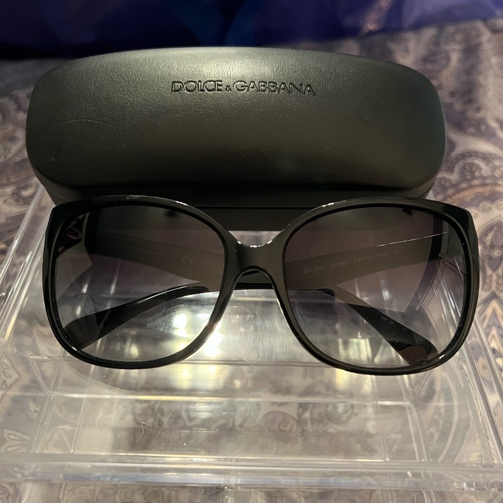 Black Dolce and Gabanna gradient sunglasses.